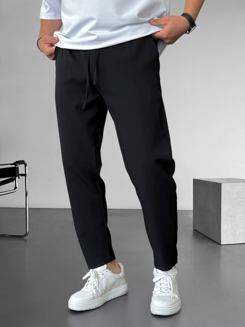 Elegante, taps toelopende broek met trekkoord