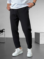 Elegante, taps toelopende broek met trekkoord