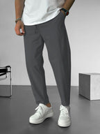 Elegante, taps toelopende broek met trekkoord