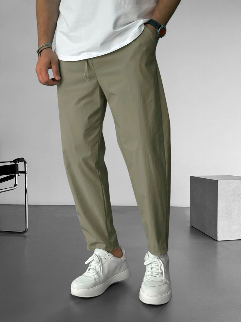 Elegante, taps toelopende broek met trekkoord