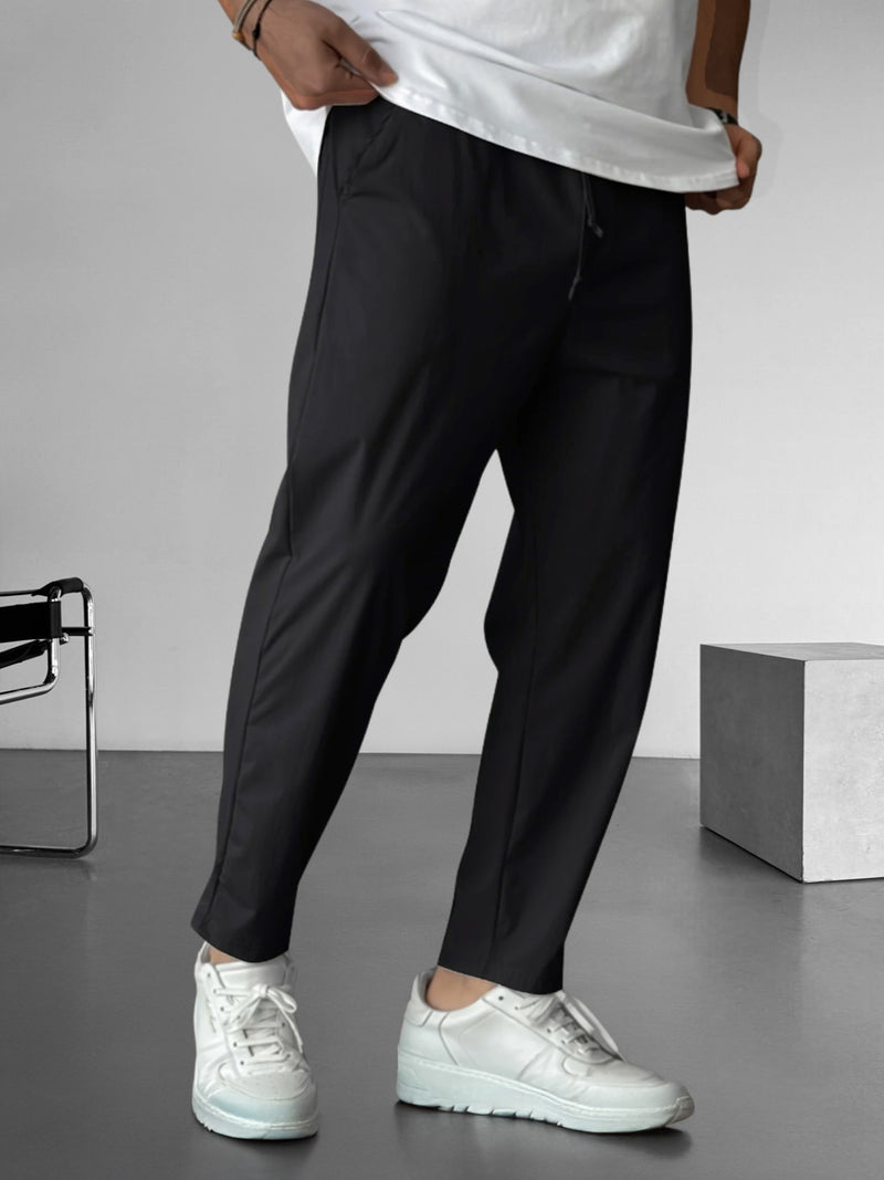 Elegante, taps toelopende broek met trekkoord