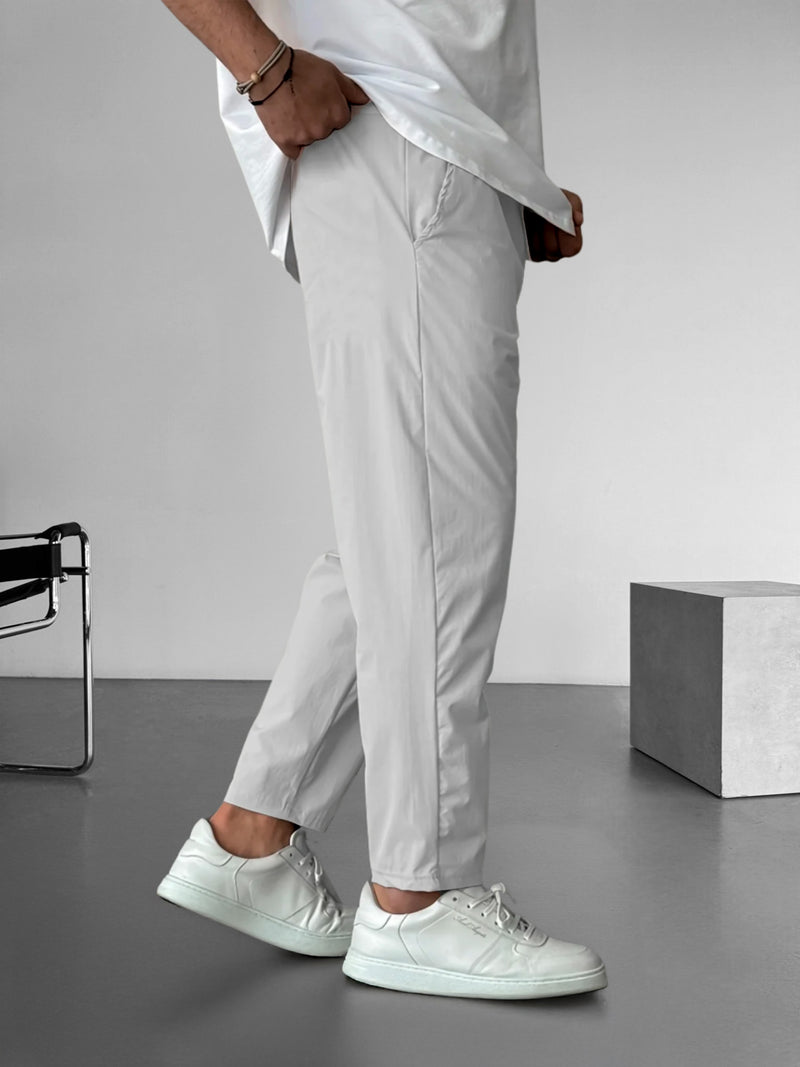 Elegante, taps toelopende broek met trekkoord