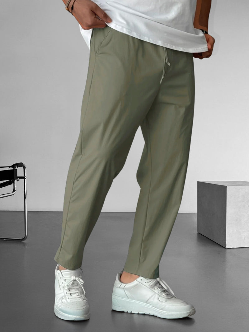 Elegante, taps toelopende broek met trekkoord