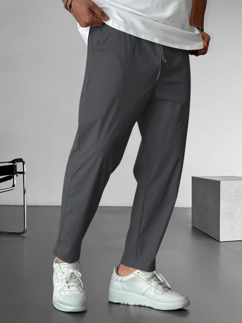 Elegante, taps toelopende broek met trekkoord