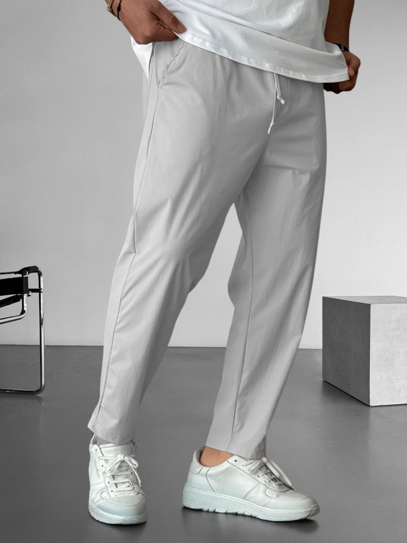 Elegante, taps toelopende broek met trekkoord